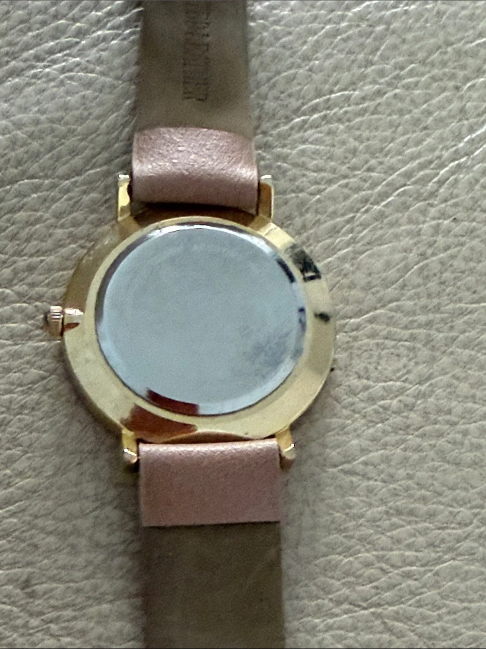 Tahari Blush Leather Strap Watch with Rose Gold Accents needs battery